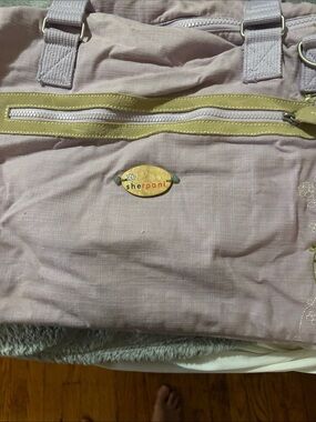 Sherpani mauve tote with lime trim